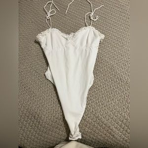 REVOLVE super down bodysuit